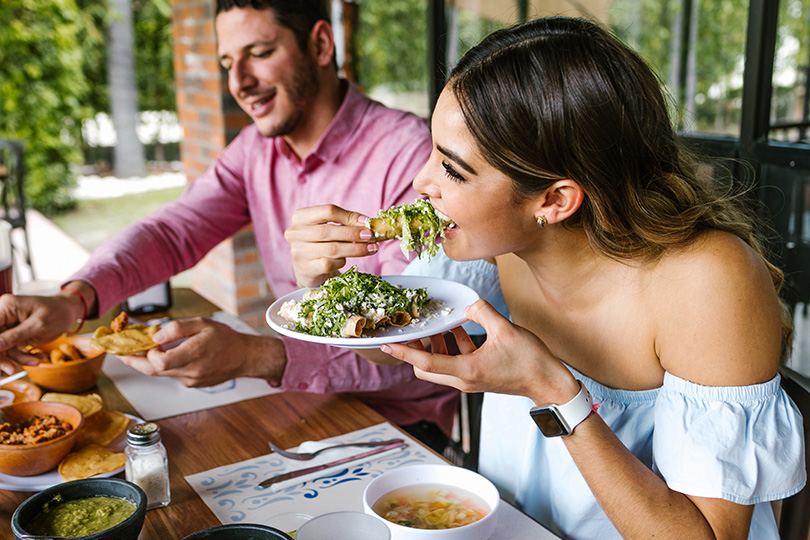 Woman enjoys healthy food.
