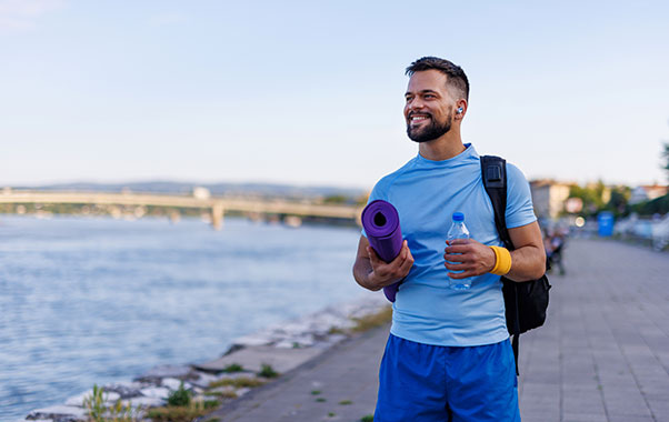 Man exercising to stay on top of men’s health.
