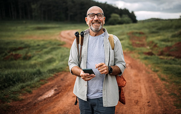 Man outdoors maintaining bone strength and overall health.