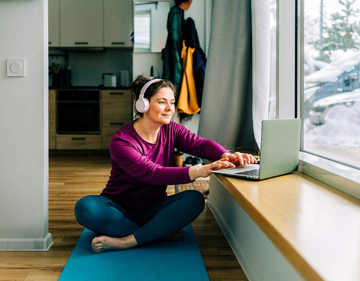 Healthy woman enjoying morning checking on health.