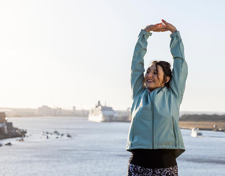 Women outdoors stretching