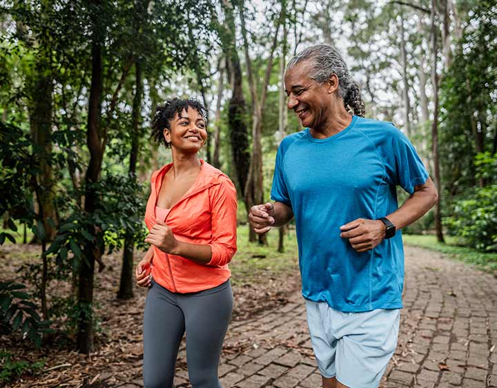 Man and woman exercising outdoors