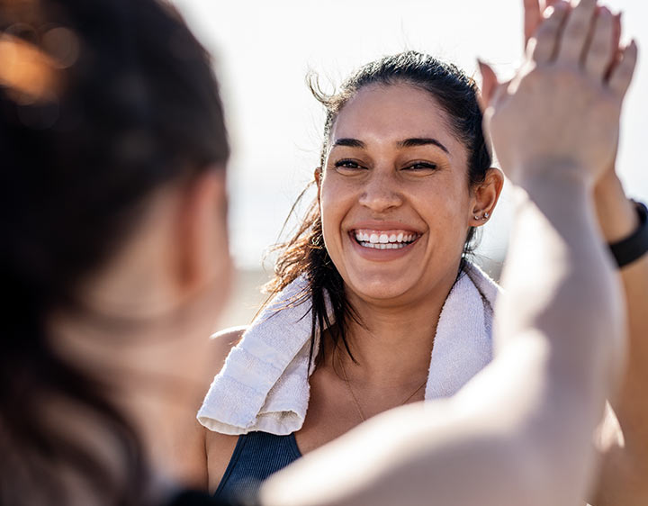 Woman being active outdoors for weight management.