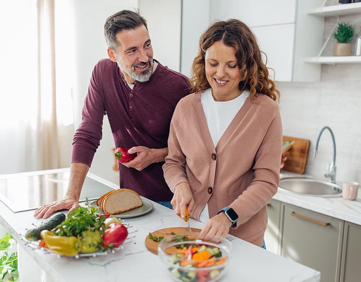 Couple preparing nutritious, gut-friendly meal