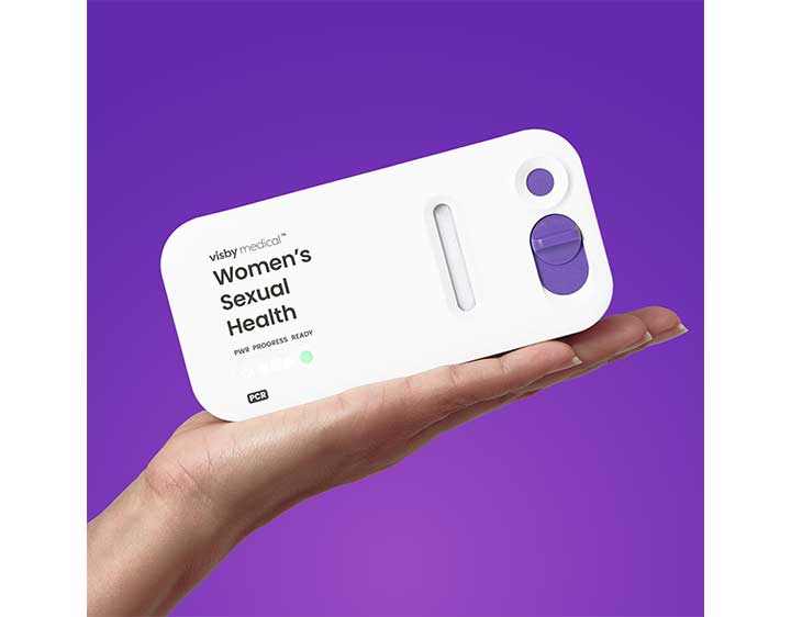 The Visby Rapid PCR At-Home Female STI Test being held in a womans hand