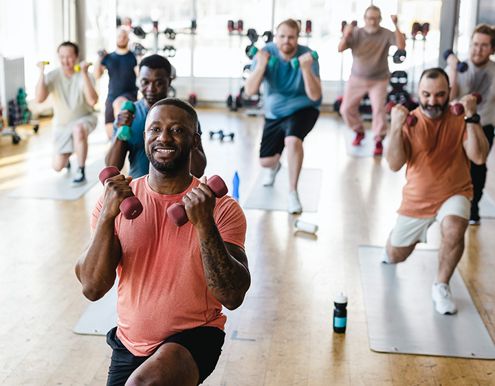group of people doing exercise happily