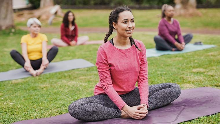 PCOS females exercising outdoors to optimize hormone levels.
