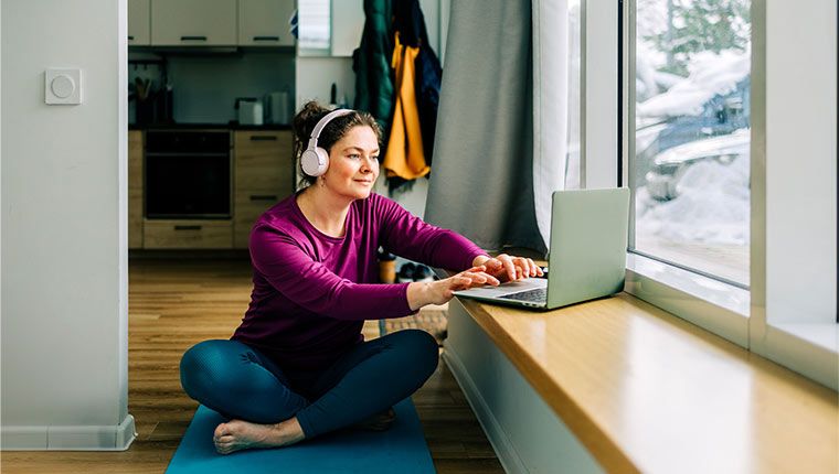 Healthy woman enjoying morning checking on health.