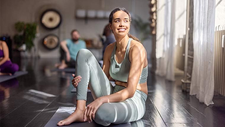 Woman exercising optimizing hormone levels.