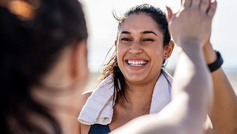 Woman being active outdoors for weight management.