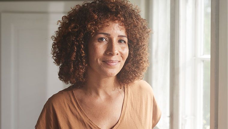 Middle-aged woman navigating the menopause journey with hormone testing.